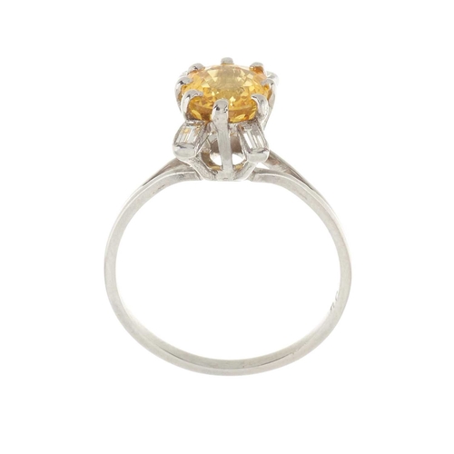 190 - An 18ct gold yellow sapphire and diamond dress ring, sapphire estimated weight 2.20ct, estimated tot... 