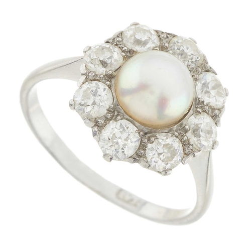 20 - An early 20th century platinum pearl and old-cut diamond cluster ring, pearl measures approximately ... 