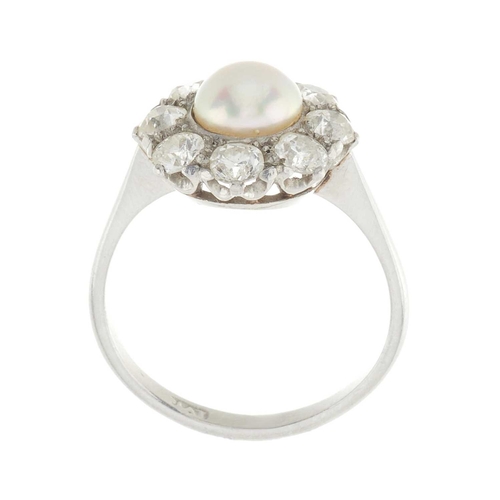 20 - An early 20th century platinum pearl and old-cut diamond cluster ring, pearl measures approximately ... 