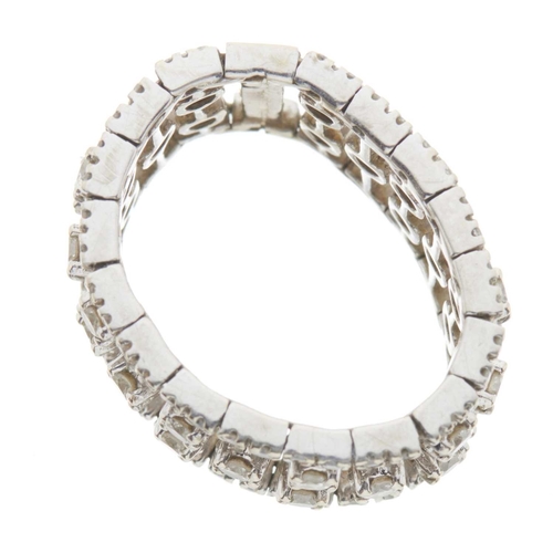 203 - A brilliant-cut diamond articulated full eternity ring, of openwork design, estimated total diamond ... 