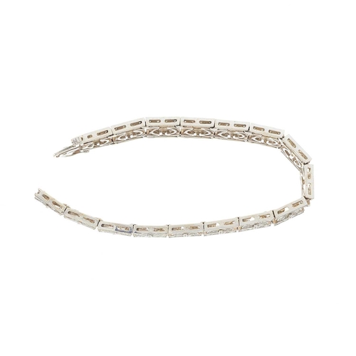 209 - A 14ct gold brilliant-cut diamond geometric bracelet, estimated total diamond weight 3.50ct, predomi... 