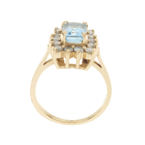 217 - A 14ct gold blue topaz and brilliant-cut diamond cluster ring, topaz estimated weight 1.40ct, estima... 