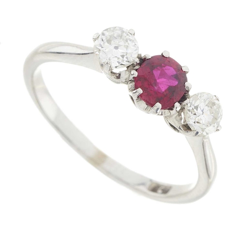 225 - A mid 20th century 9ct gold ruby and circular-cut diamond three-stone ring, estimated total diamond ... 