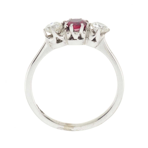 225 - A mid 20th century 9ct gold ruby and circular-cut diamond three-stone ring, estimated total diamond ... 