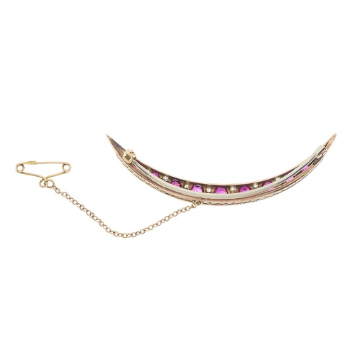 23 - A late Victorian gold ruby and old-cut diamond crescent brooch, principal ruby measures approximatel... 