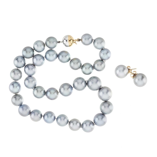 233 - A Tahitian cultured pearl single-strand necklace, with spherical push piece clasp, together with a p... 