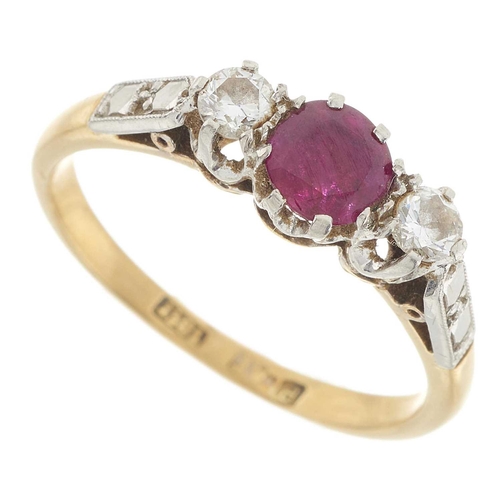 242 - A mid 20th century, ruby and brilliant-cut diamond three-stone ring, estimated total diamond weight ... 