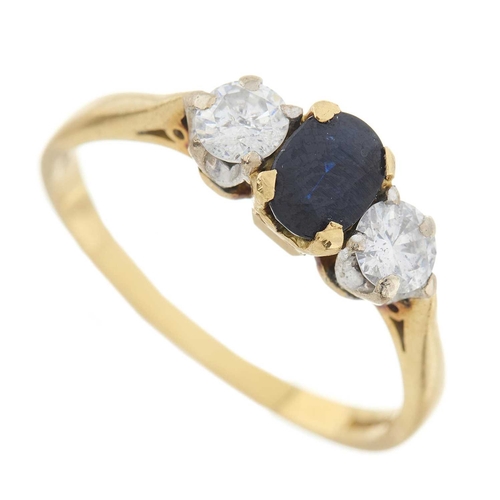 244 - An 18ct gold sapphire and brilliant-cut diamond three-stone ring, estimated total diamond weight 0.4... 