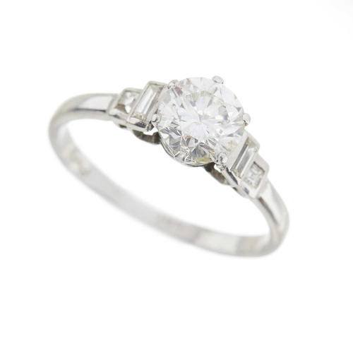 247 - A mid 20th century platinum brilliant-cut diamond single-stone ring, with vari-cut diamond stepped s... 