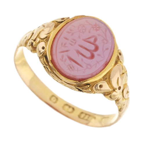 26 - A mid Victorian 15ct gold carnelian intaglio seal signet ring, carved to depict an Arabic script, ha... 