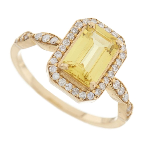 262 - A 14ct gold citrine and brilliant-cut diamond cluster dress ring, with similarly-cut diamond line sh... 