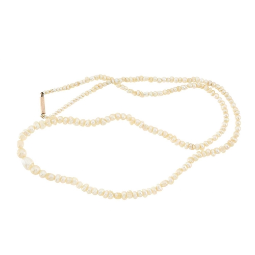 30 - A natural pearl single-strand necklace, with 9ct gold barrel clasp, with report from The Gem & Pearl... 