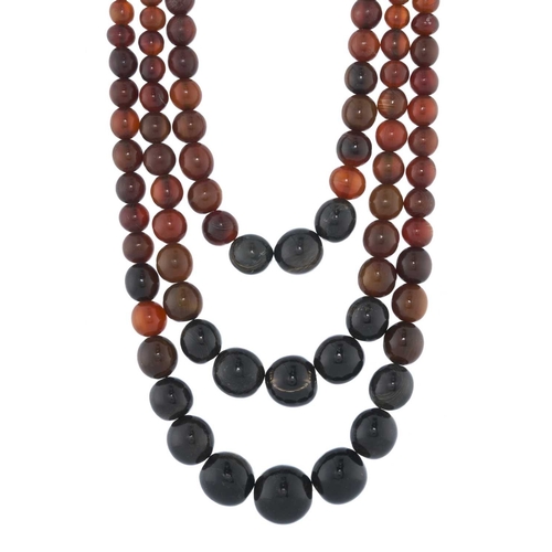 339 - Angela Caputi, a small selection of resin jewellery, to include a long triple-stranded beaded neckla... 