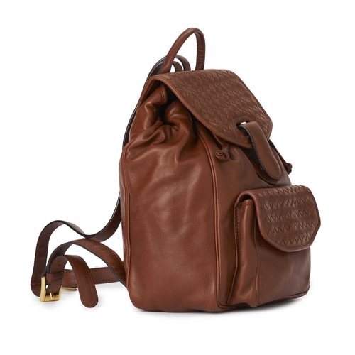 344 - Bottega Veneta, a tan leather Intrecciato backpack, crafted from soft tan lambskin leather, featurin... 