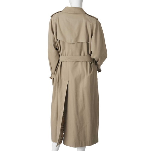 346 - Burberry, a ladies classic trench coat, designed with a notched lapel collar, buttoned epaulettes, d... 