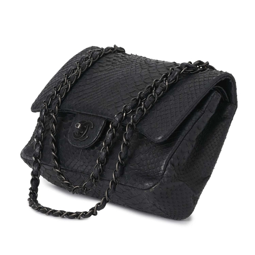 356 - Chanel, a python So Black Medium Double Flap handbag, featuring a black python skin exterior, with m... 