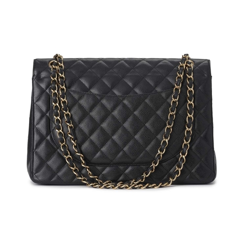 357 - Chanel, a Maxi Classic Double Flap handbag, designed with a black quilted caviar leather exterior, p... 