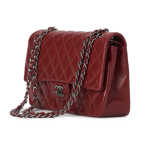 358 - Chanel, a red Medium Classic Double Flap handbag, designed with a quilted red lambskin leather exter... 