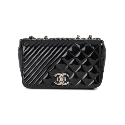 360 - Chanel, a Small Coco Boy Flap handbag, featuring a quilted black patent leather exterior, with polis... 