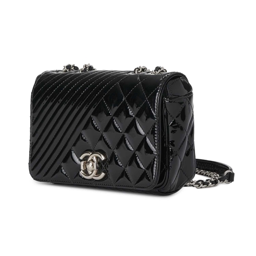 360 - Chanel, a Small Coco Boy Flap handbag, featuring a quilted black patent leather exterior, with polis... 