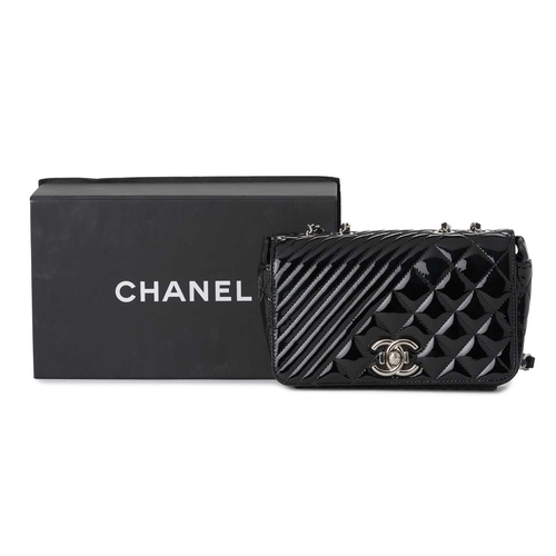 360 - Chanel, a Small Coco Boy Flap handbag, featuring a quilted black patent leather exterior, with polis... 