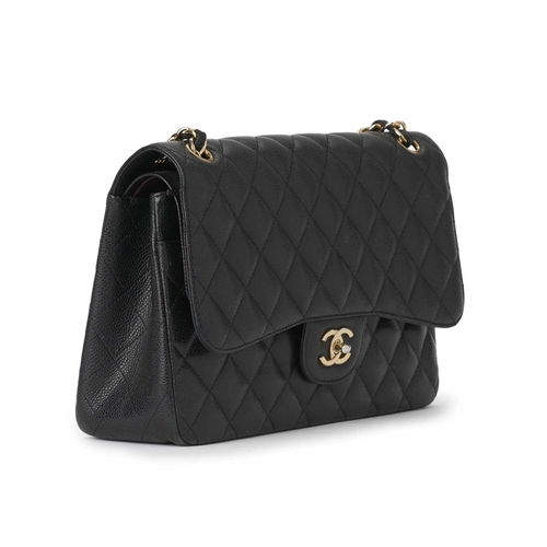 362 - Chanel, a Jumbo Classic Double Flap handbag, featuring a black quilted caviar leather exterior, with... 