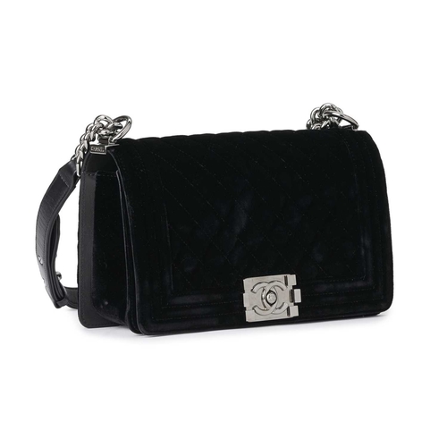 363 - Chanel, a medium velvet Boy handbag, designed with a black velvet exterior, featuring diamond quilti... 