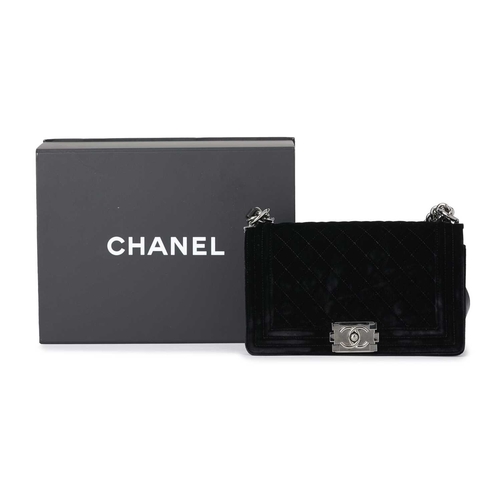 363 - Chanel, a medium velvet Boy handbag, designed with a black velvet exterior, featuring diamond quilti... 