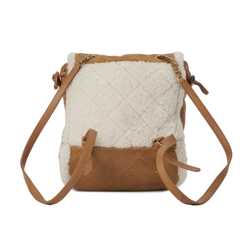 367 - Chanel, a Neige shearling backpack, crafted from diamond quilted caramel suede, with lambswool trim ... 