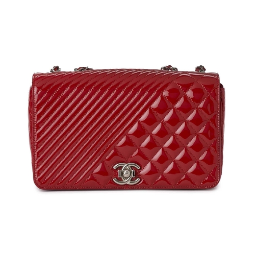 370 - Chanel, a Medium Coco Boy Flap handbag, featuring a quilted red patent leather exterior, with polish... 