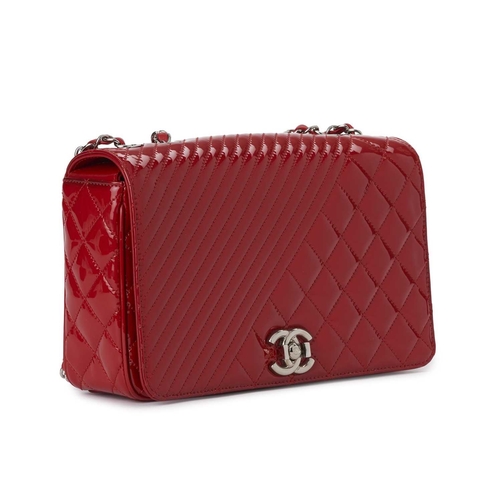 370 - Chanel, a Medium Coco Boy Flap handbag, featuring a quilted red patent leather exterior, with polish... 