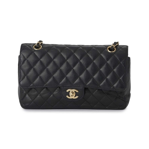 371 - Chanel, a Medium Classic Double Flap handbag, designed with a diamond quilted caviar leather exterio... 