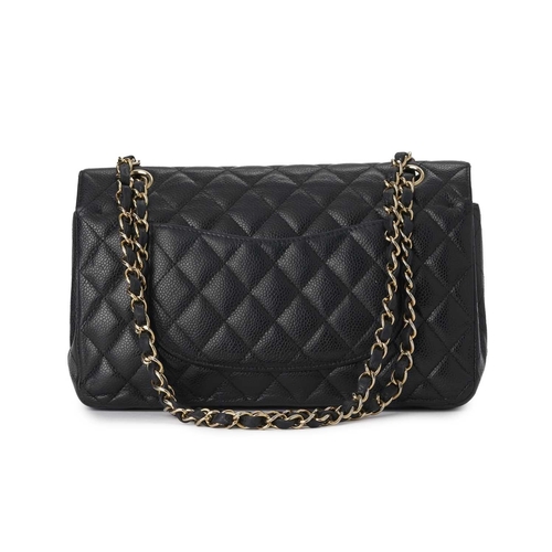 371 - Chanel, a Medium Classic Double Flap handbag, designed with a diamond quilted caviar leather exterio... 