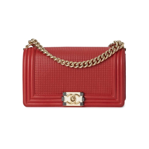 373 - Chanel, a Medium Cube Embossed Boy handbag, crafted from red leather, designed with a cube embossed ... 