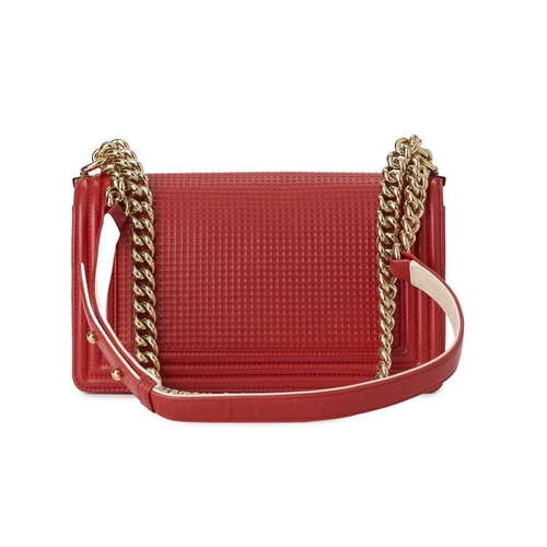 373 - Chanel, a Medium Cube Embossed Boy handbag, crafted from red leather, designed with a cube embossed ... 