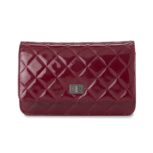 376 - Chanel, a Reissue Wallet On Chain handbag, crafted from diamond quilted pink patent leather, featuri... 