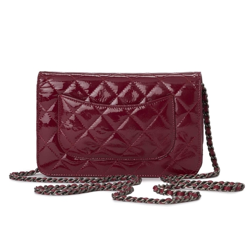 376 - Chanel, a Reissue Wallet On Chain handbag, crafted from diamond quilted pink patent leather, featuri... 