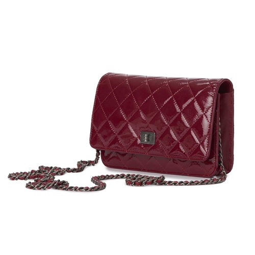 376 - Chanel, a Reissue Wallet On Chain handbag, crafted from diamond quilted pink patent leather, featuri... 