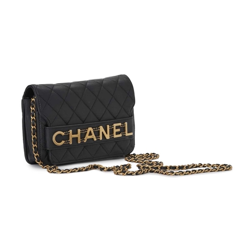 377 - Chanel, an Enchained Wallet On Chain handbag, crafted from black calfskin quilted leather, featuring... 