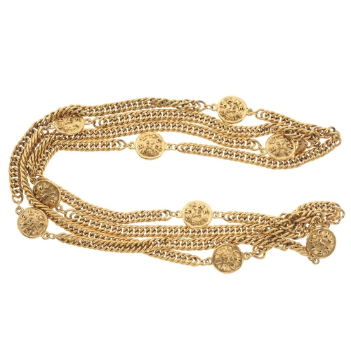 385 - Chanel, a vintage 1980s long lion medallion necklace, the gold-tone chain necklace, featuring lion a... 