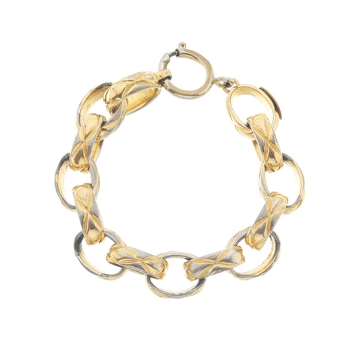 389 - Chanel, a vintage keyring and bracelet, to include a quilted gold-tone oval-link bracelet with sprin... 