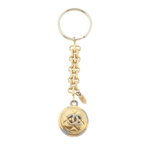 389 - Chanel, a vintage keyring and bracelet, to include a quilted gold-tone oval-link bracelet with sprin... 