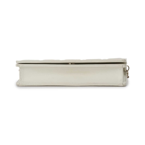 396 - Christian Dior, a white Cannage chain clutch, designed with the maker's signature cannage quilted wh... 