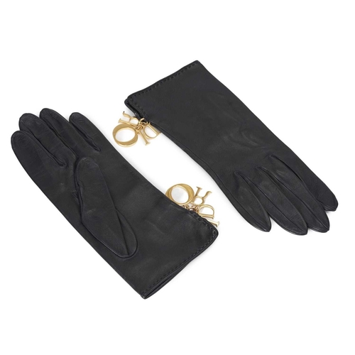 397 - Christian Dior, a pair of 90s vintage black leather gloves, crafted from soft lambskin leather, feat... 