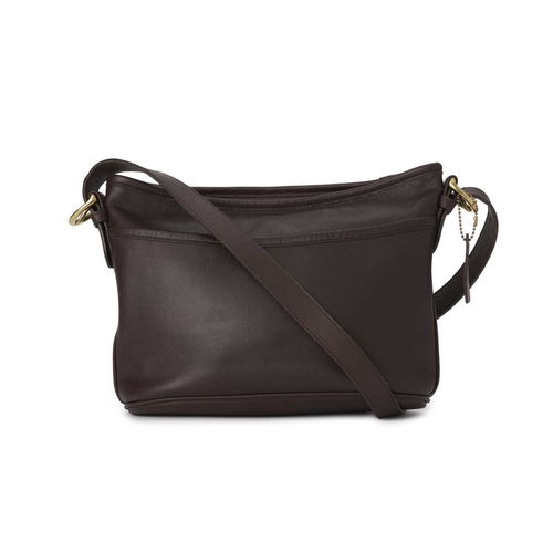 402 - Coach, a vintage leather crossbody handbag, crafted from mahogany brown leather, featuring a front s... 