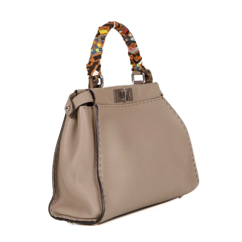 405 - Fendi, a medium Peekaboo Selleria handbag w/Twilly, designed with a grey leather exterior, featuring... 