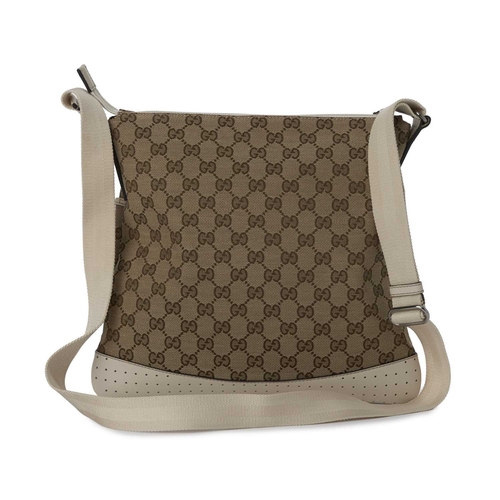 418 - Gucci, a medium messenger bag, designed with the maker's GG monogram canvas exterior with cream leat... 