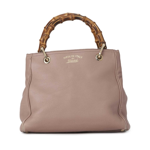 421 - Gucci, a small Bamboo Shopper handbag, crafted from grained dusty pink calf leather, with gold-tone ... 