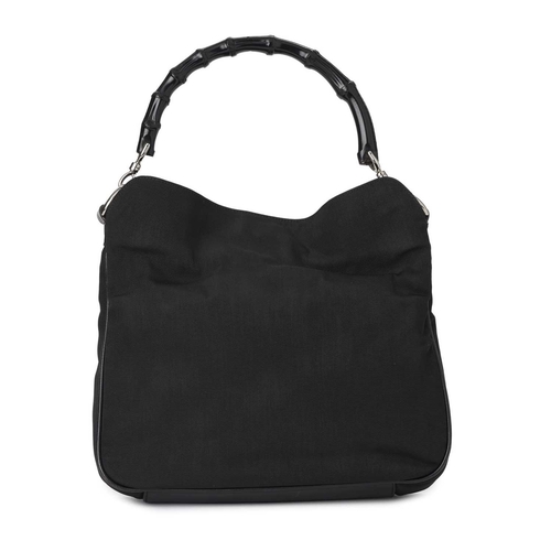 422 - Gucci, a Bamboo Top Handle handbag, designed with a black nylon exterior with black leather base and... 