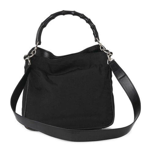 422 - Gucci, a Bamboo Top Handle handbag, designed with a black nylon exterior with black leather base and... 